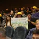 Алматыда өткен қоғамдық тыңдауда жастар плакаттармен Almaty Superski жобасын қолдады