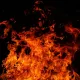 Участок трассы под Астаной в дыму из-за степного пожара