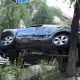 Необычное ДТП в Алматы: автомобиль повис на дереве