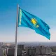 Государственный флаг подняли на 100-метровом флагштоке в Шымкенте